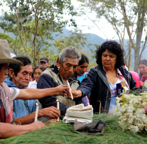 Berta Caceres in the Rio Blanco region of western Honduras where she, COPINH (the Council of Popular and Indigenous Organizations of Honduras) and the people of Rio Blanco have maintained a two year struggle to halt construction on the Agua Zarca Hydroelectric project, that poses grave threats to local environment, river and indigenous Lenca people from the region. She gathered with members of COPINH and Rio Blanco during a meeting remembering community members killed during the two year struggle.
